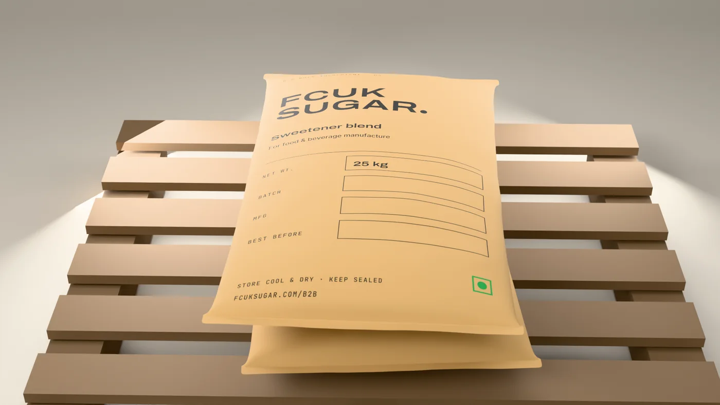 Two 25 kg FCUK SUGAR kraft sacks stacked on a wooden pallet.