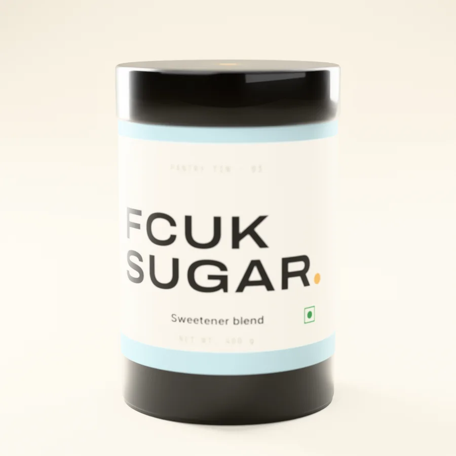 FCUK SUGAR Pantry Tin — black tin with a paper label.